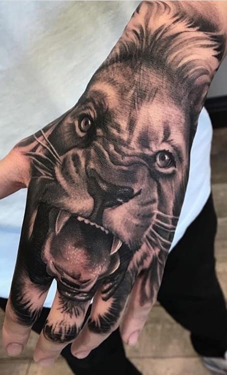 tatuaje de leon 55
