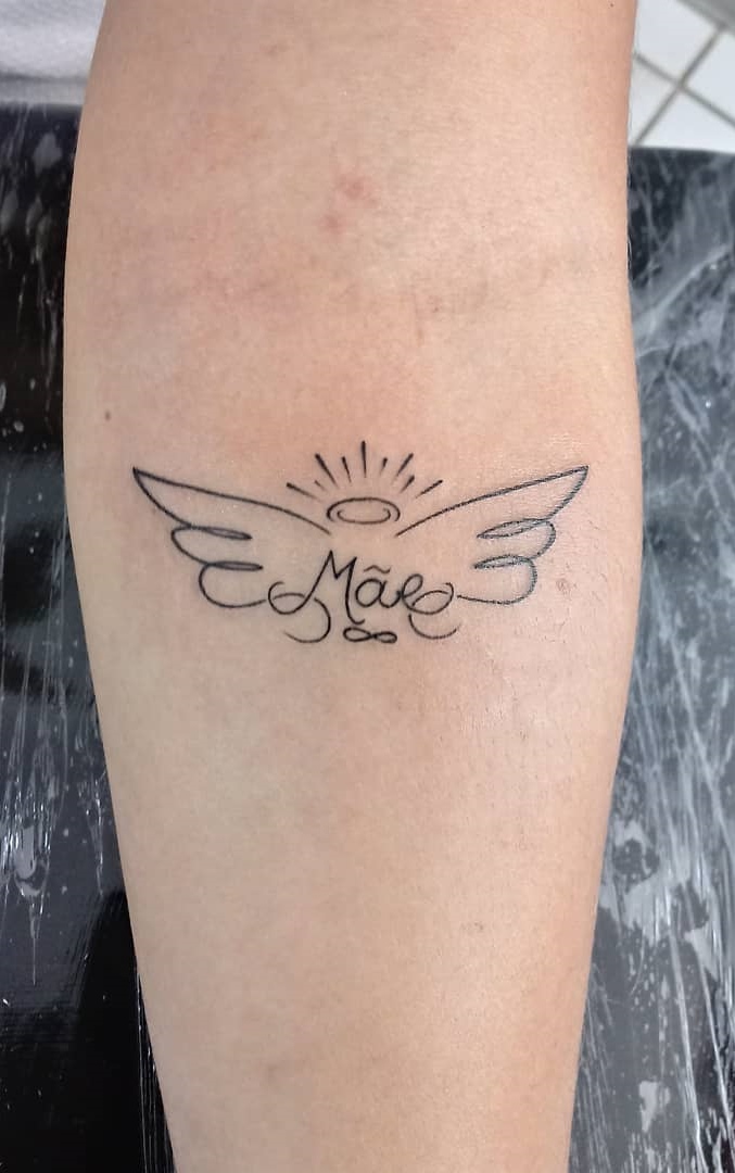 tatuaje de letras en mujer 157