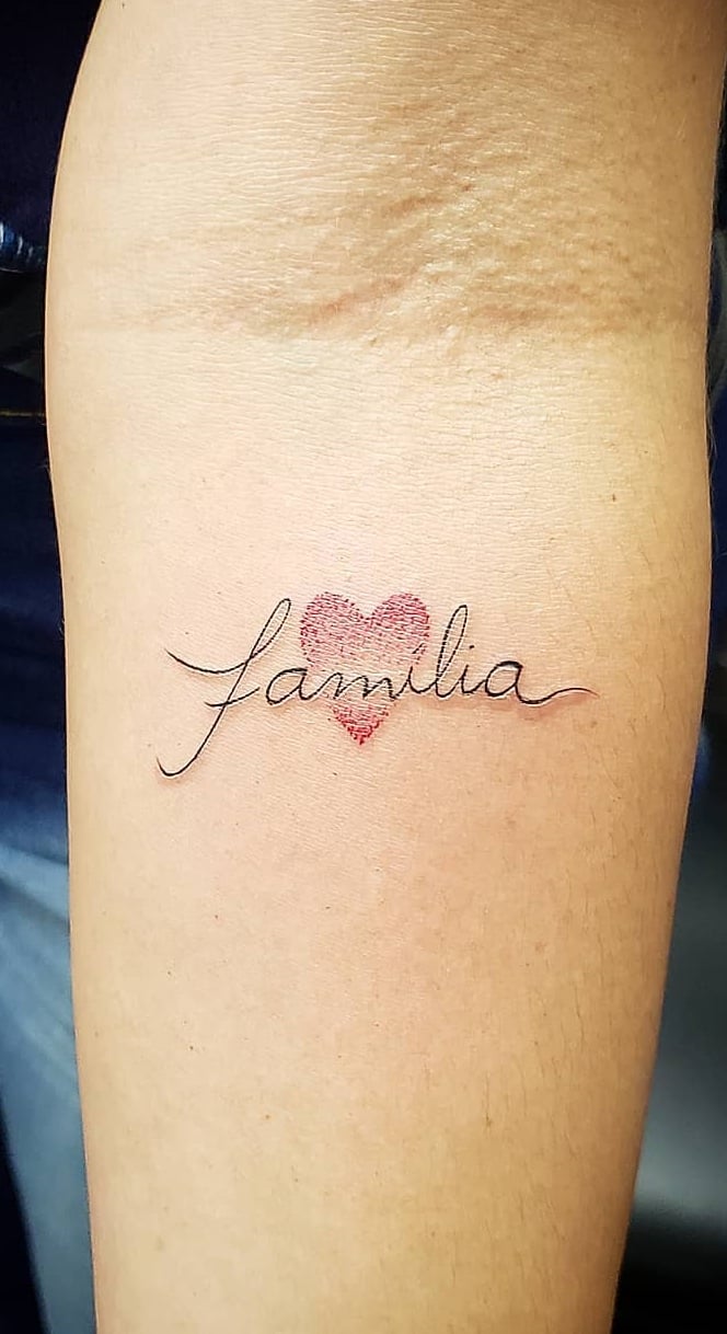 tatuaje de letras en mujer 189