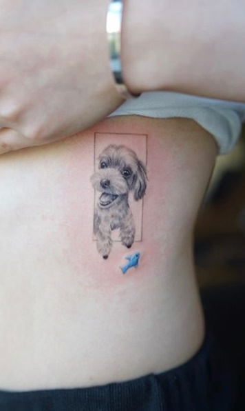 tatuaje de perro en mujer 105