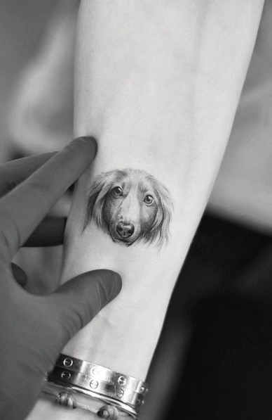 tatuaje de perro en mujer 32