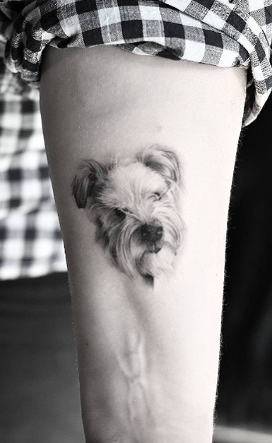 tatuaje de perro en mujer 34