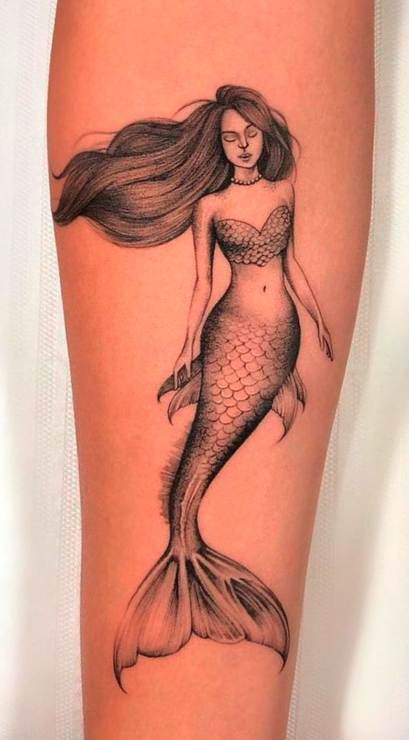 tatuaje de sirena en mujer 32