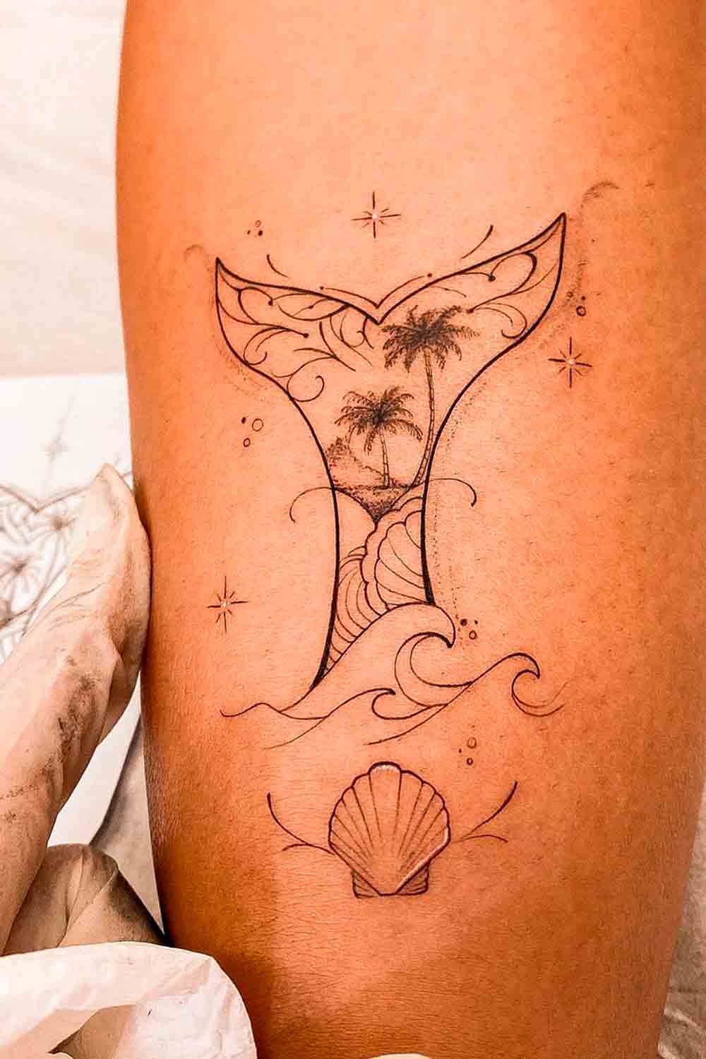 tatuaje de sirena en mujer 38