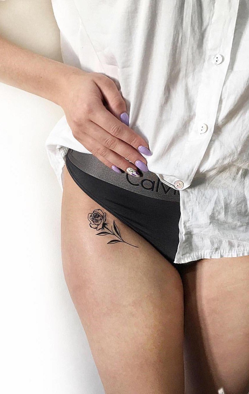 tatuaje en muslo de mujer 27
