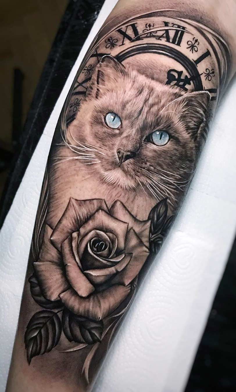 tatuaje gato en mujer 20