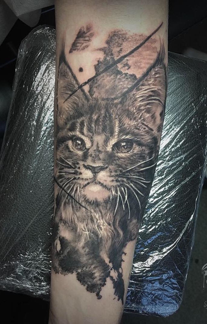 tatuaje gato en mujer 25