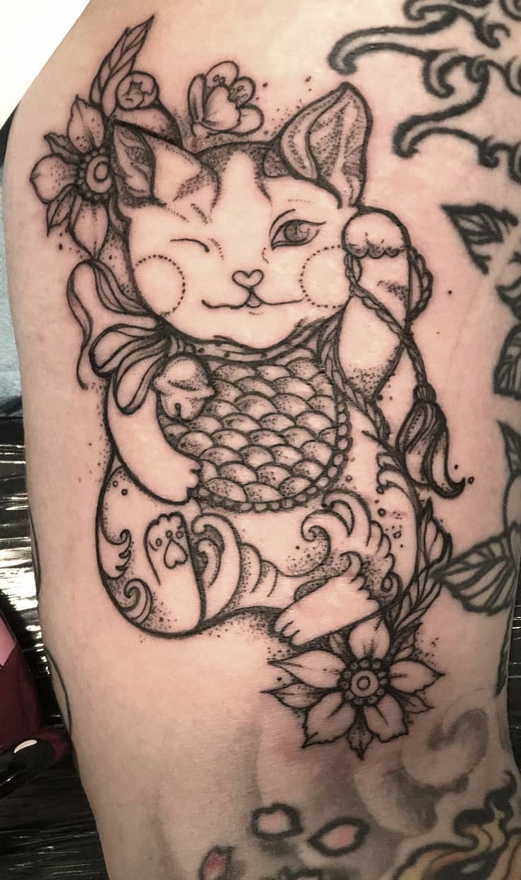 tatuaje gato en mujer 27