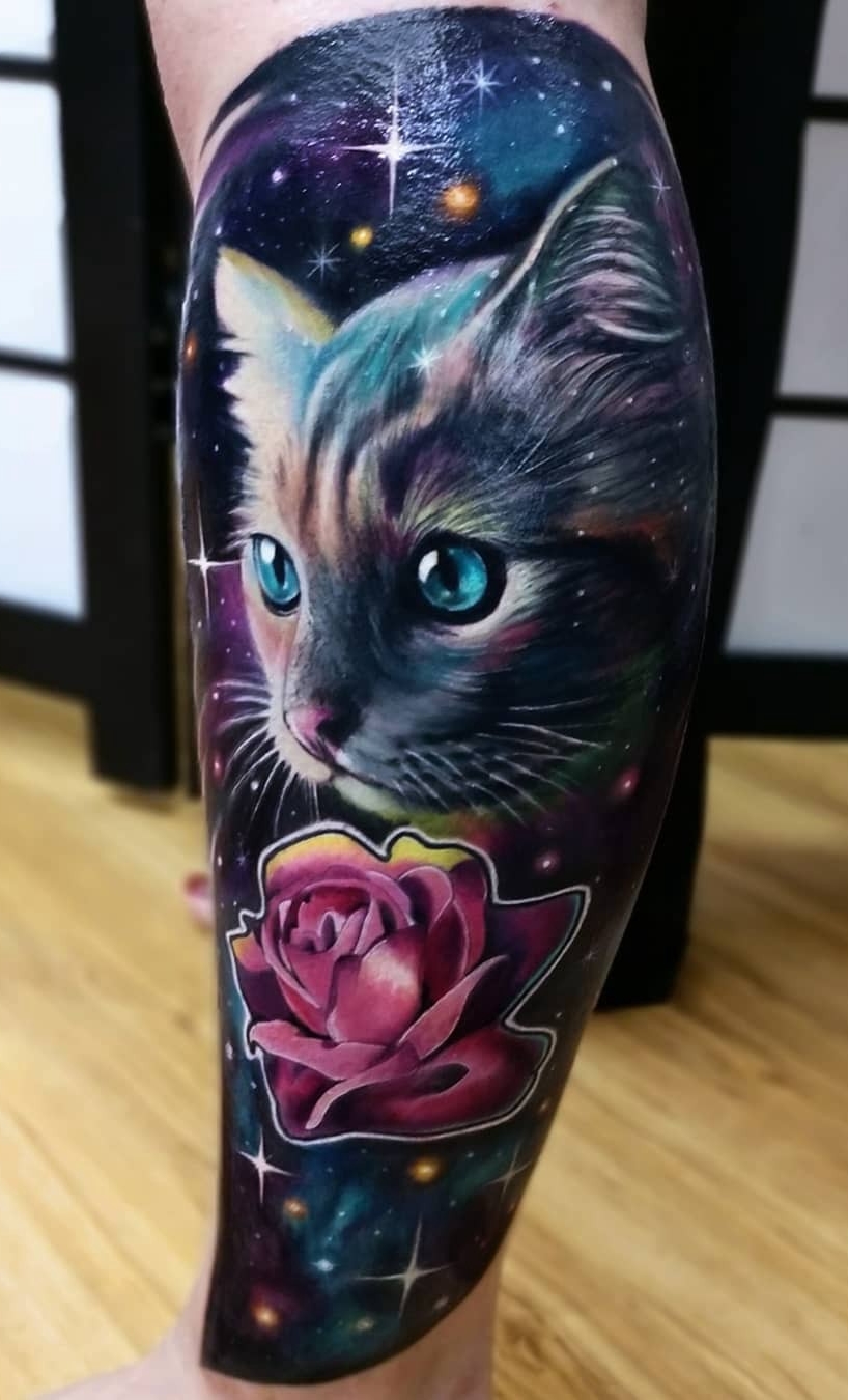 tatuaje gato en mujer 54