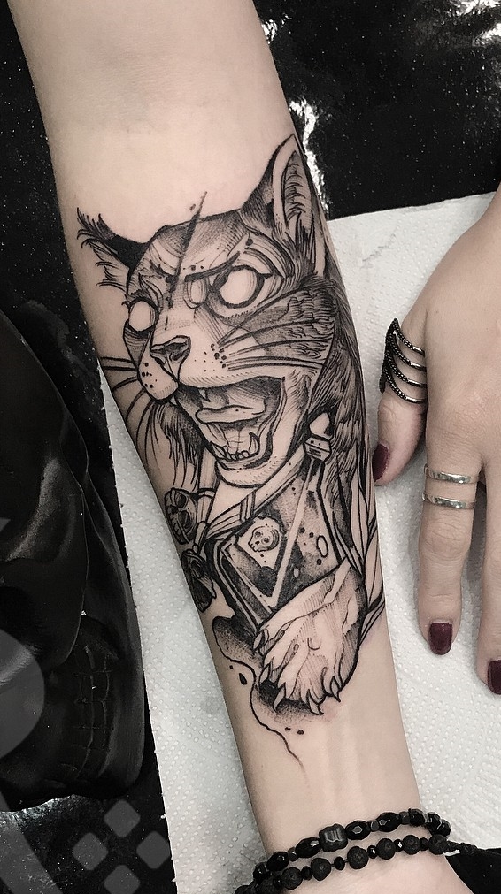 tatuaje gato en mujer 60