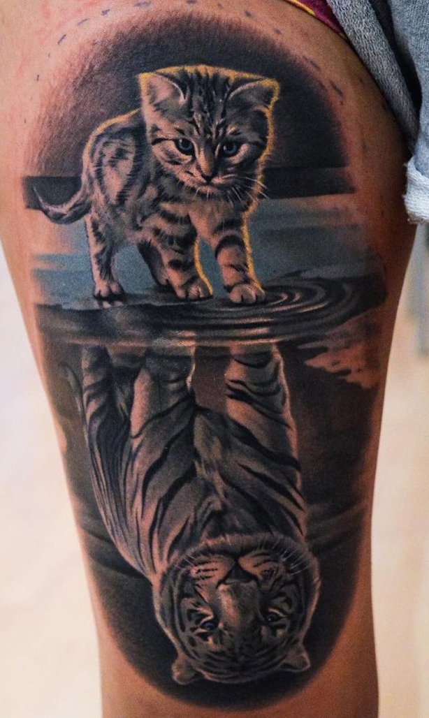 tatuaje gato en mujer 68