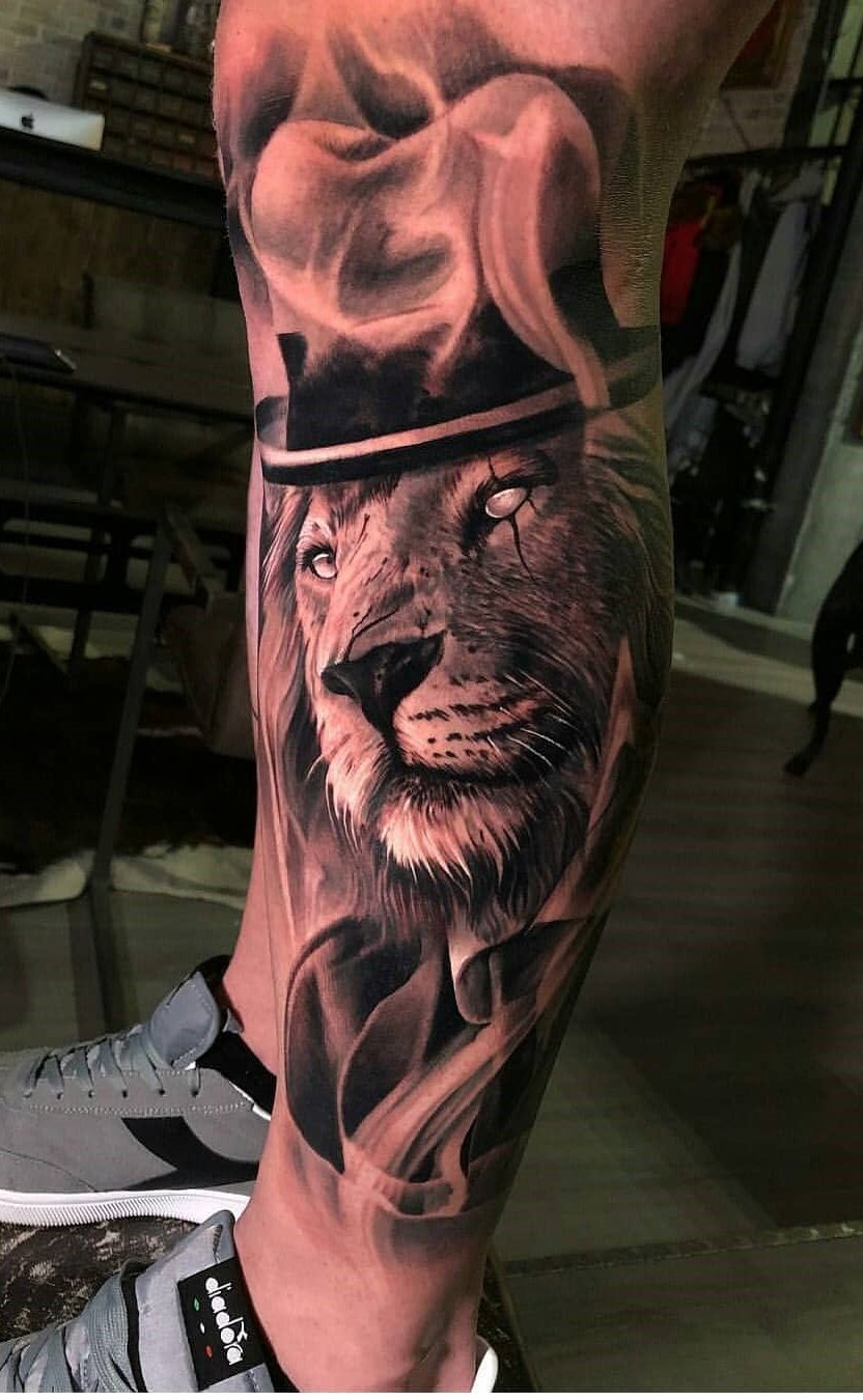 tatuaje masculino leon 63