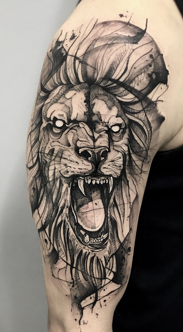 tatuaje masculino leon 66