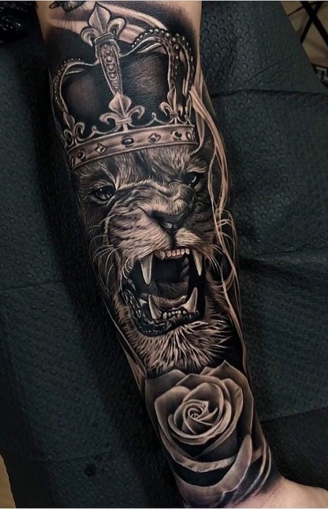 tatuaje masculino leon 74