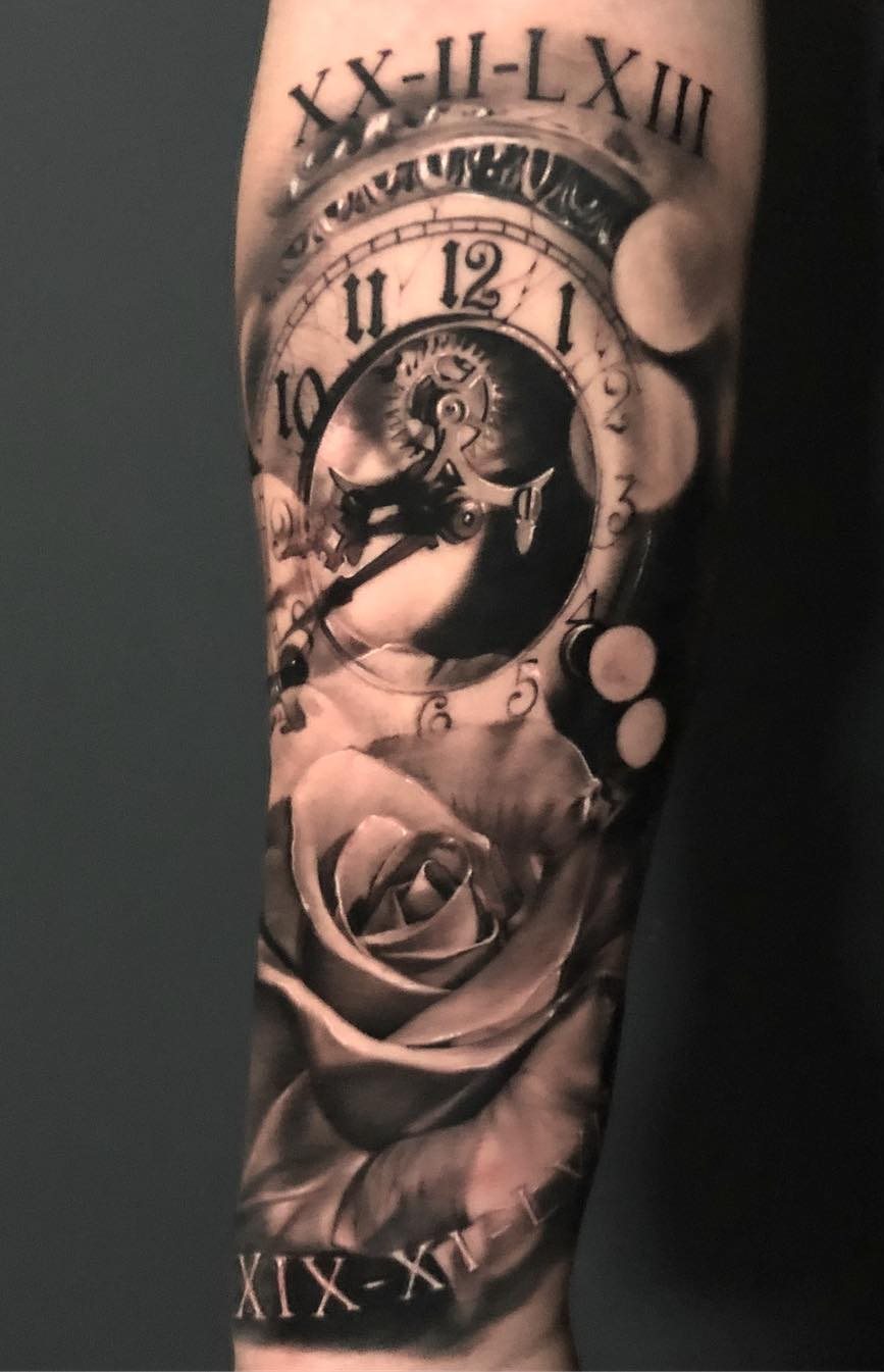 tatuaje reloj 19