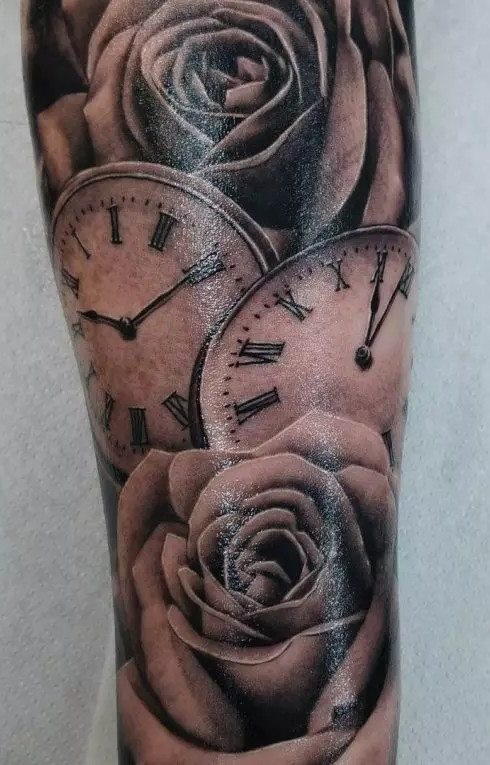 tatuaje reloj 38