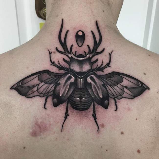 tattoo escarabajo 118