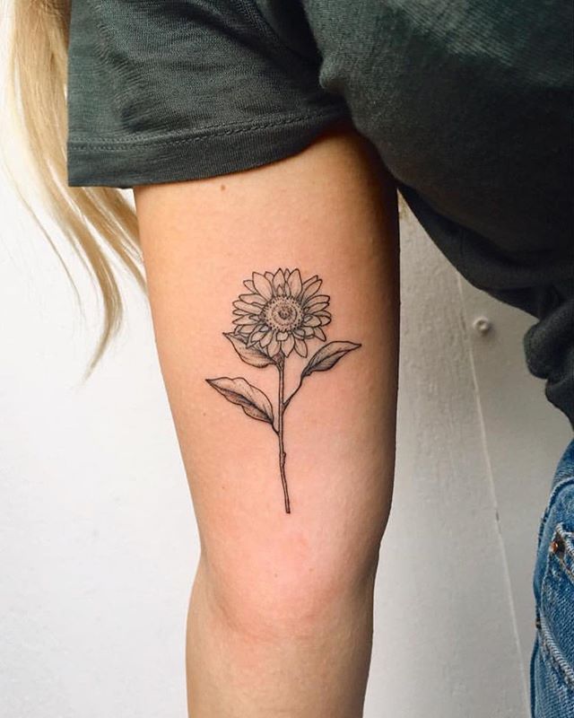 Que symbolise un tournesol sur un tatouage ?