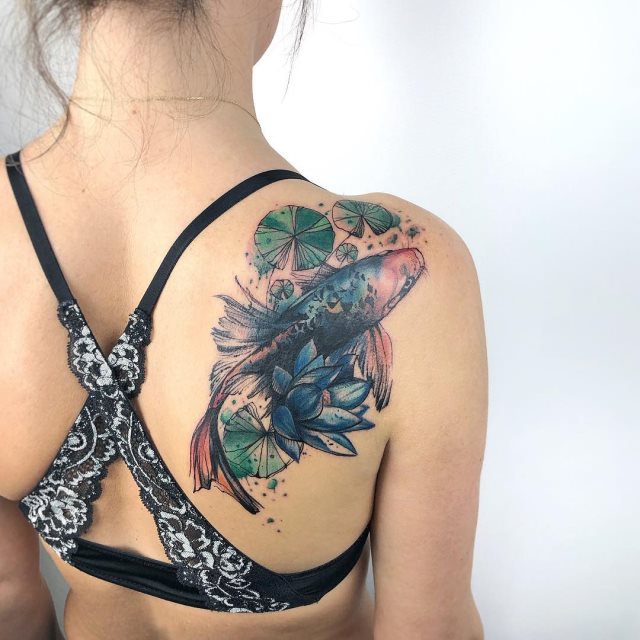 tattoo feminin de carpe 38