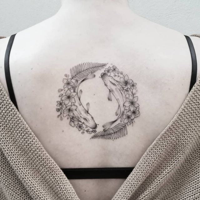 tattoo feminin de carpe 60