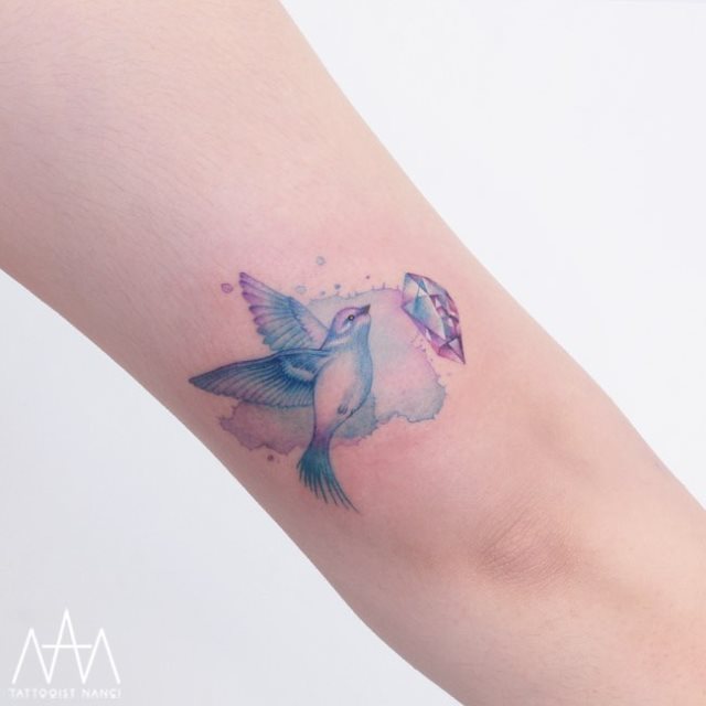 tattoo feminin oiseau 36