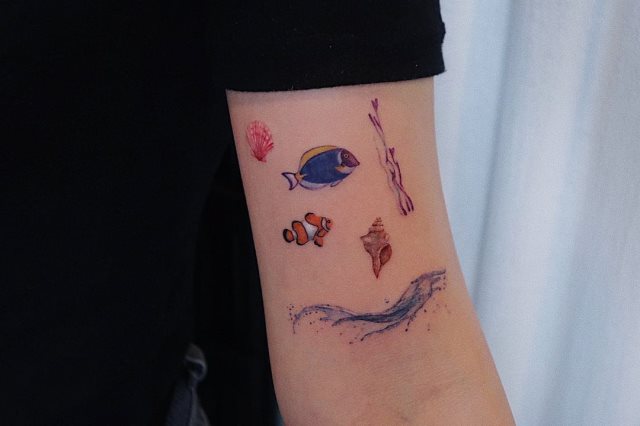 tattoo feminin poisson 28