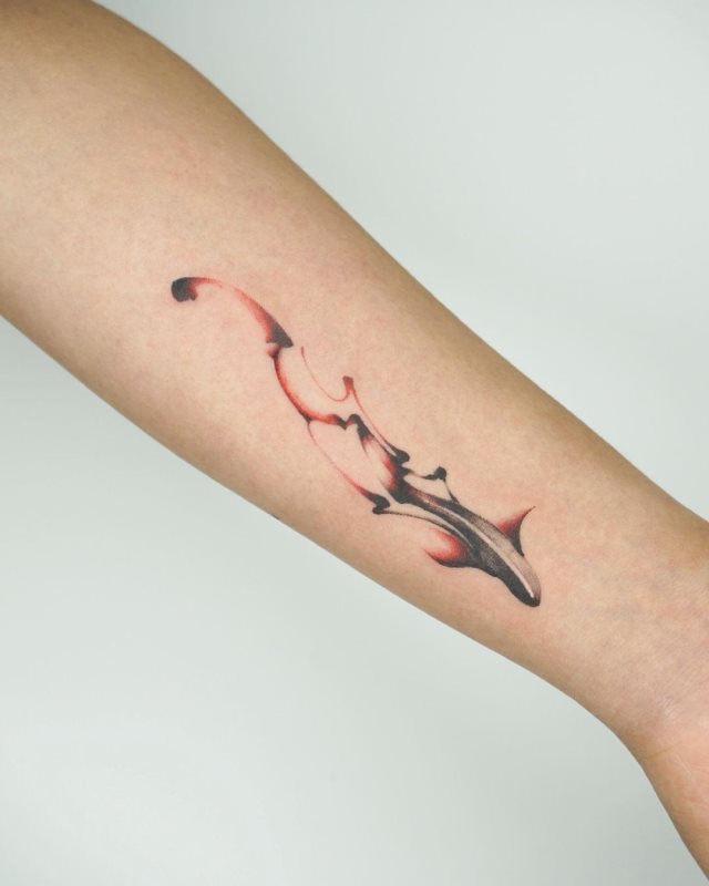 tattoo feminin poisson 47