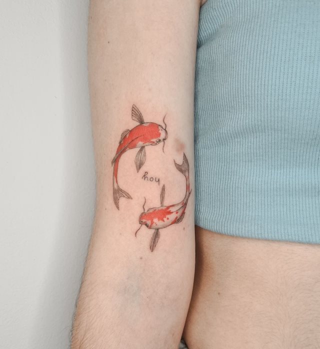 tattoo feminin poisson 54