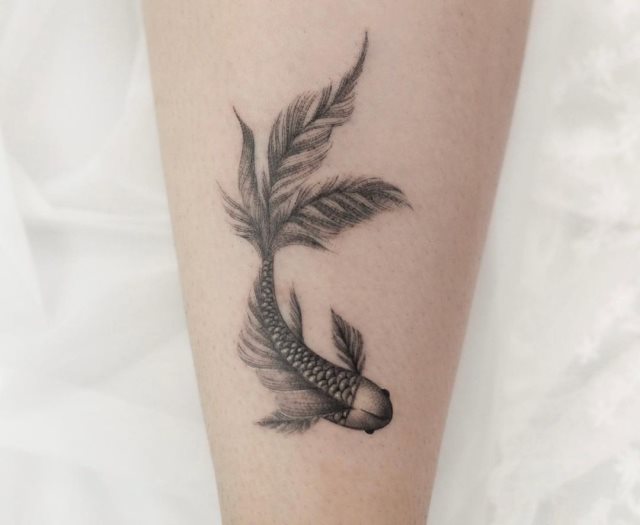 tattoo feminin poisson 73