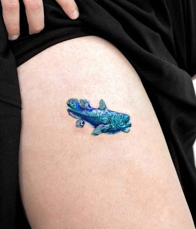 tattoo feminin poisson 76