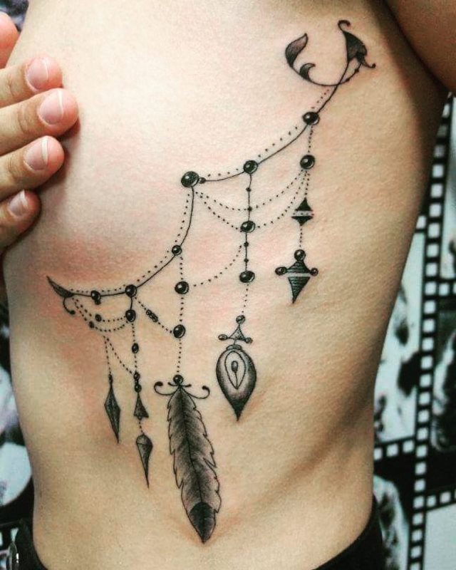 tattoo feminin pour cotes 31