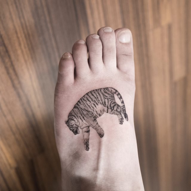 tattoo feminin pour pied 78