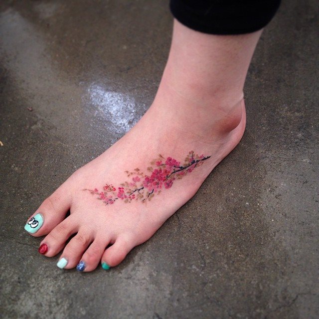 tattoo feminin pour pied 86