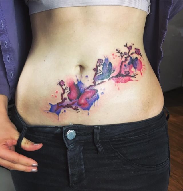 tattoo feminin pour ventre 44