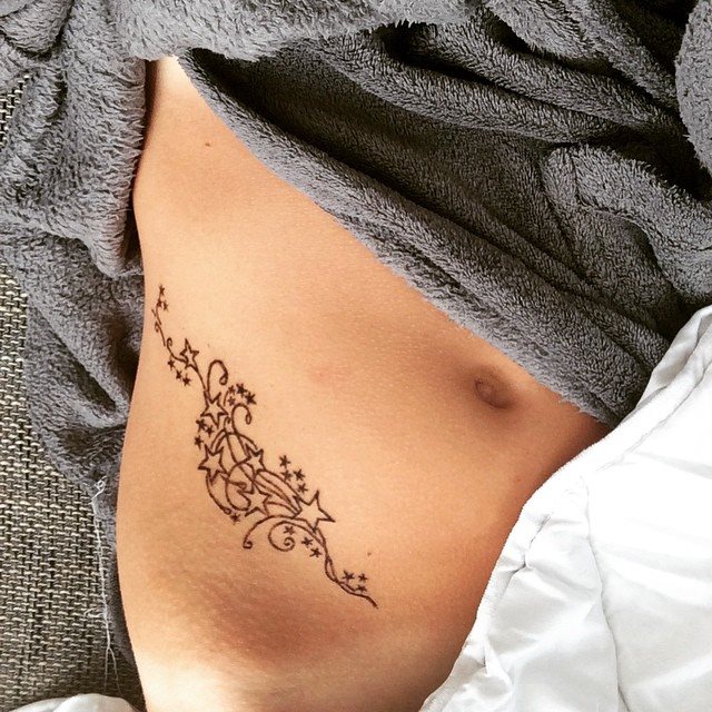 tattoo feminin pour ventre 51