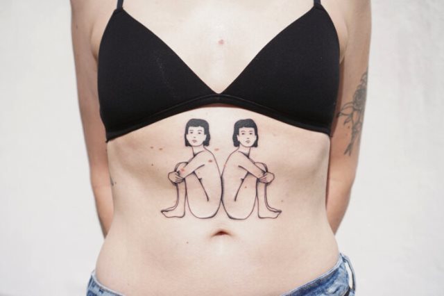 tattoo feminin pour ventre 59