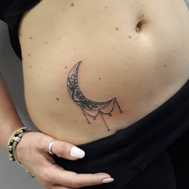 tattoo feminin pour ventre 62