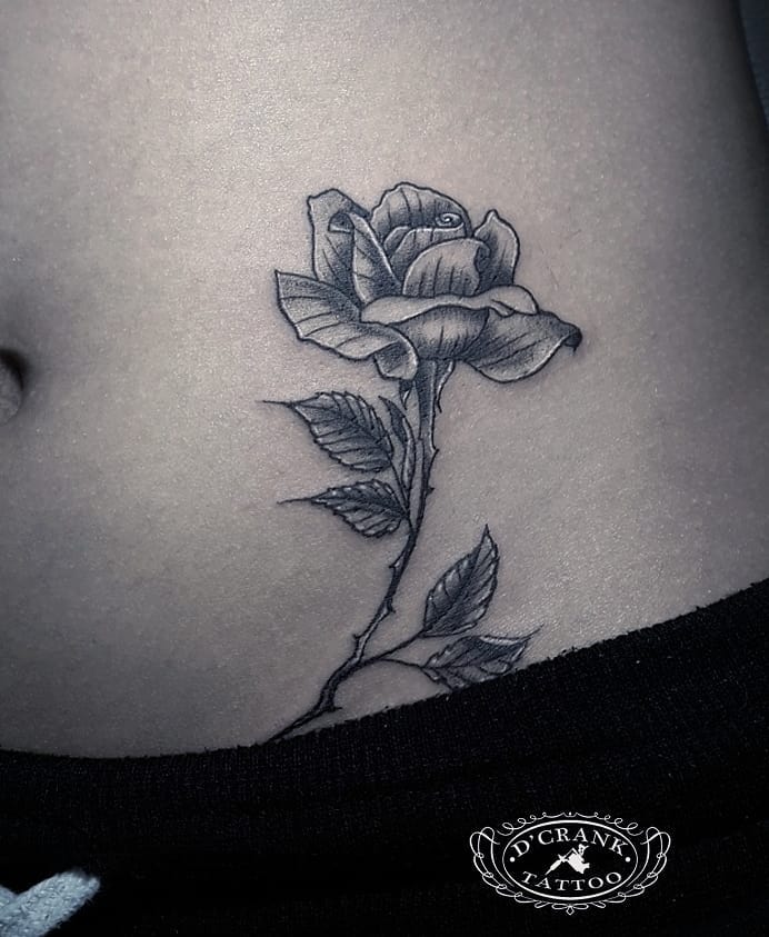 tattoo feminin pour ventre 69