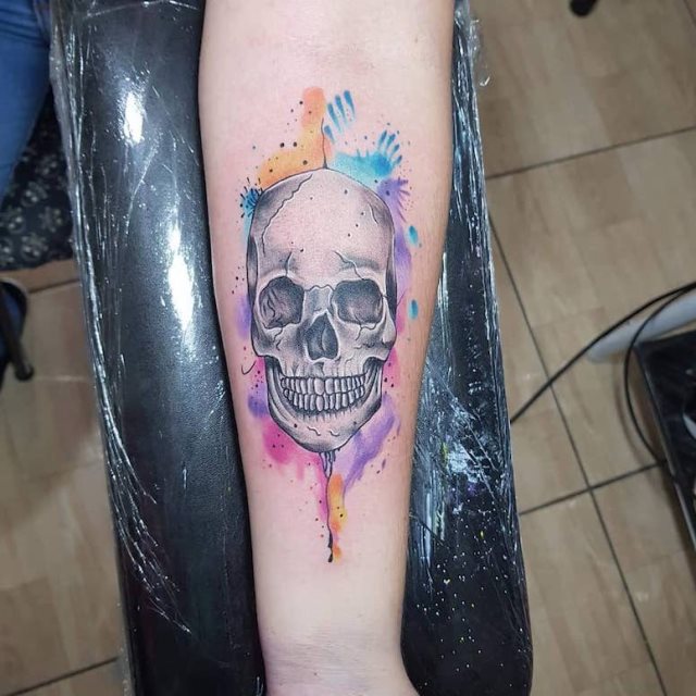 tattoo feminin tete de mort 71