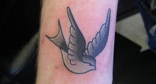 tatouage hirondelle 229