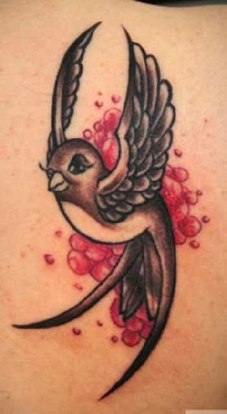 tatouage hirondelle 261