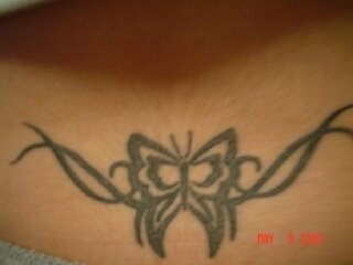 tatouage dos bas 569