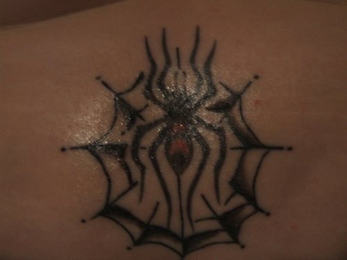 tatouage dos bas 596