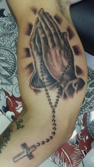 tatouage chapelet 1057