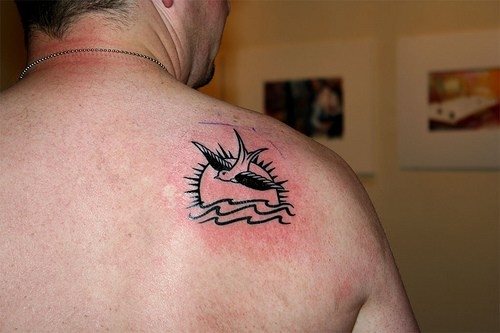 tatouage moineau 1031