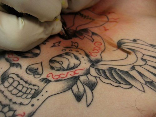 tatouage poitrine 1021