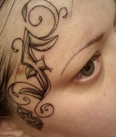 tatouage visage 515