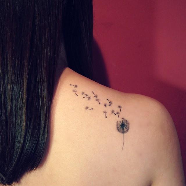 tatouage dos pour femme 113