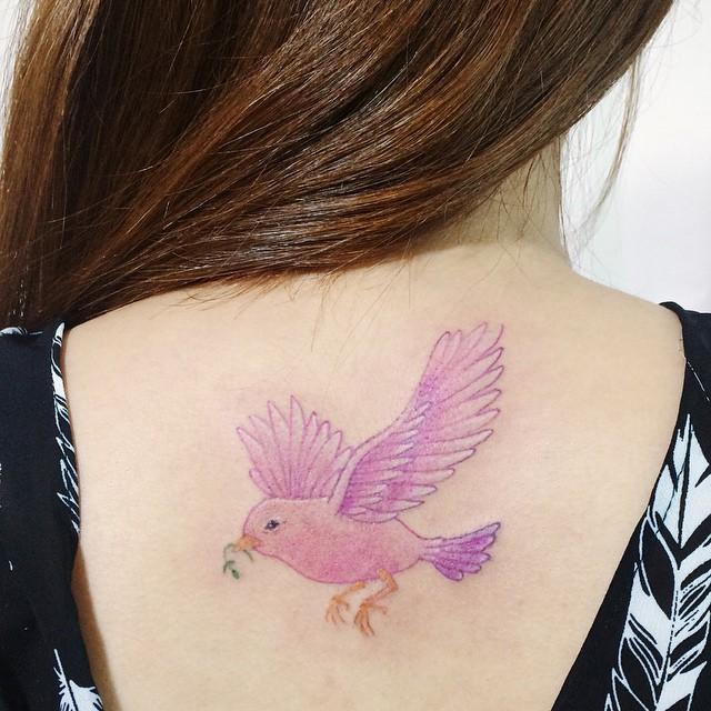 tatouage dos pour femme 129