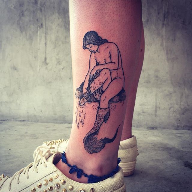 tatouage femme jambe 141